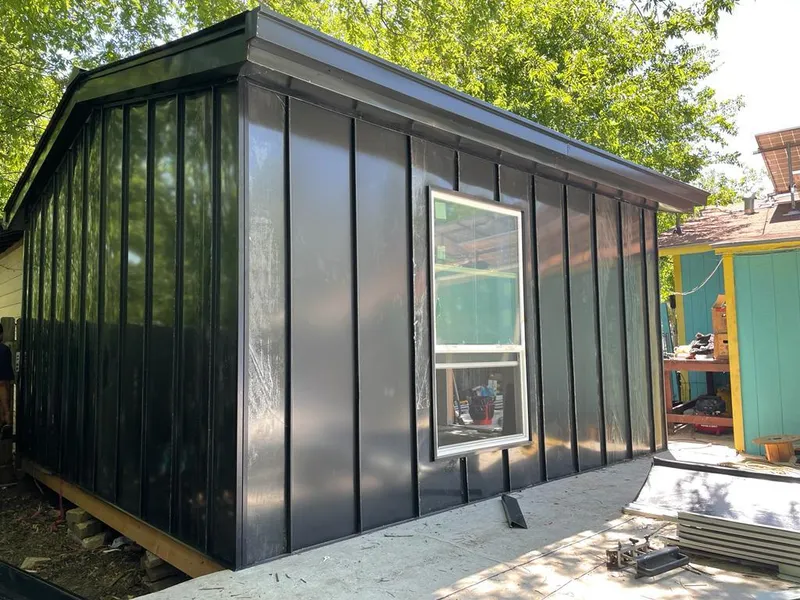 Black standing seam metal wall panels for Roof Inspection in Eaton